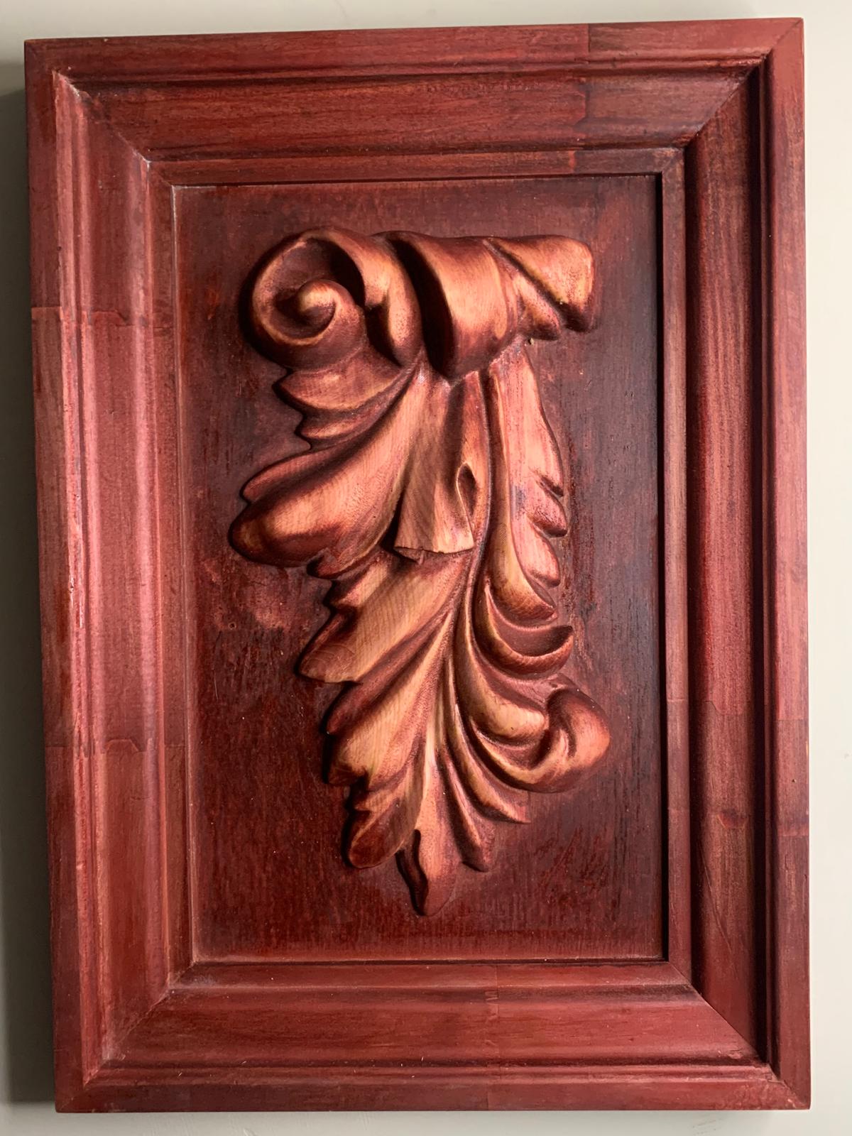 Carved acanthus leaf decorative panel in mahogany