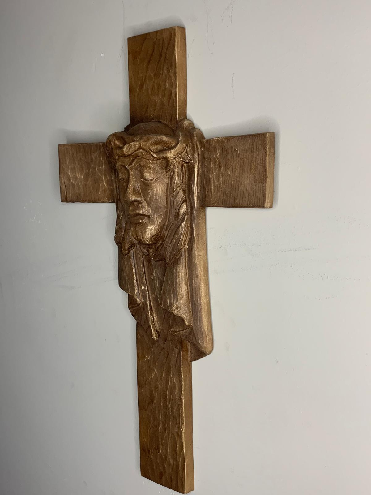 Carved cross with the face of Christ in oak