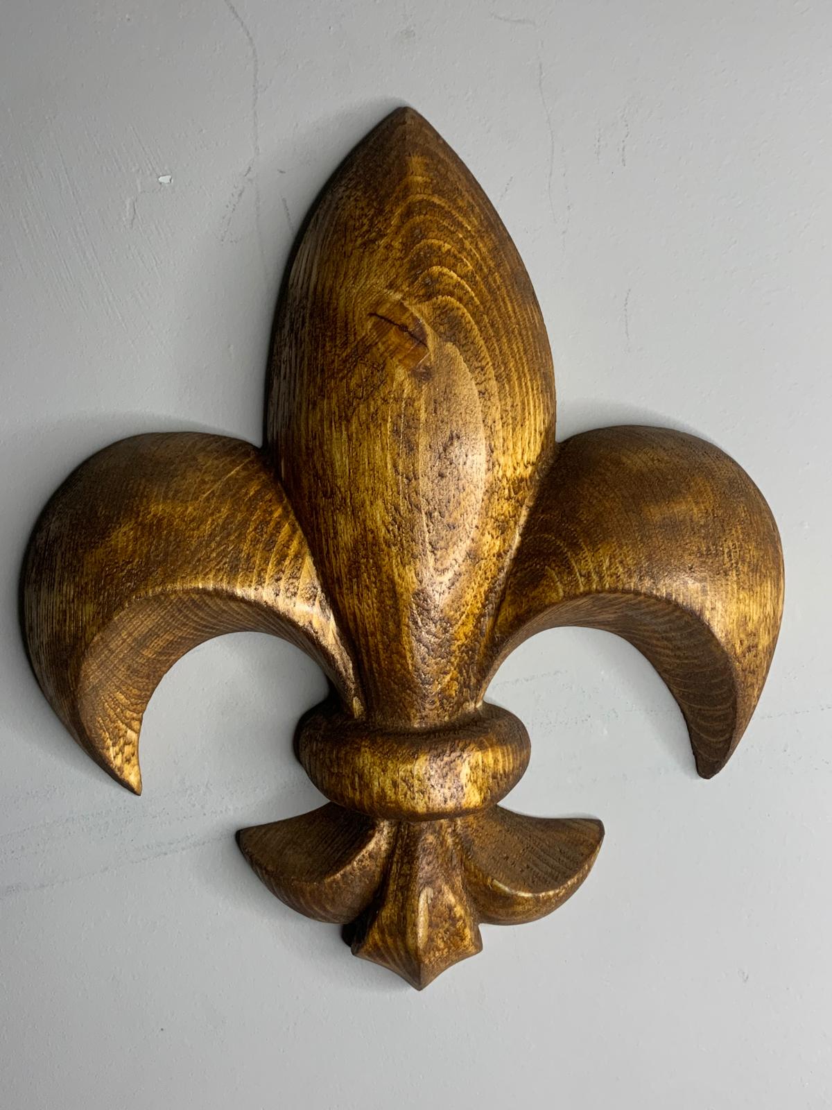 Carved fleur-de-lis in oak