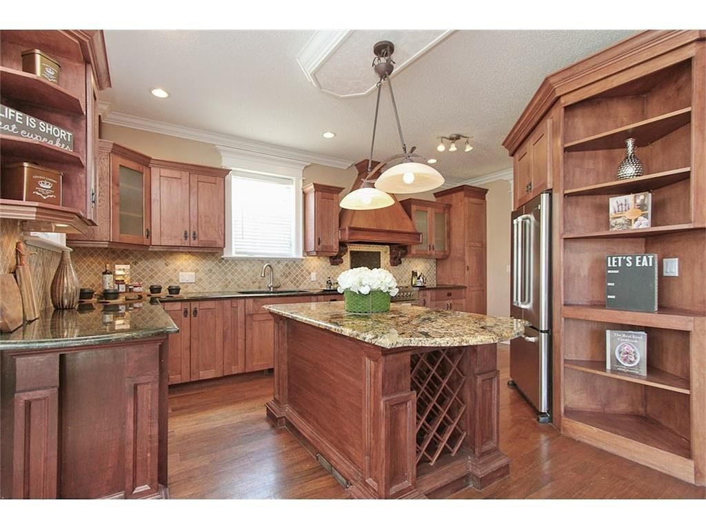 Cherry kitchen with granite island
